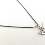 Military necklace, Guitar