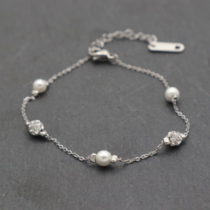 Steel bracelet with pearls and rhinestones