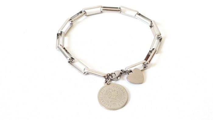 Steel bracelet with coin and heart