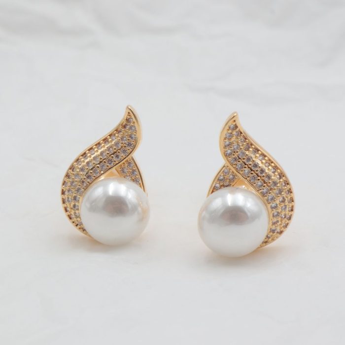 Clip earrings with rhinestones and pearls