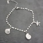 Ατσάλινη αλυσίδα ποδιού με πέρλες και κοχύλι