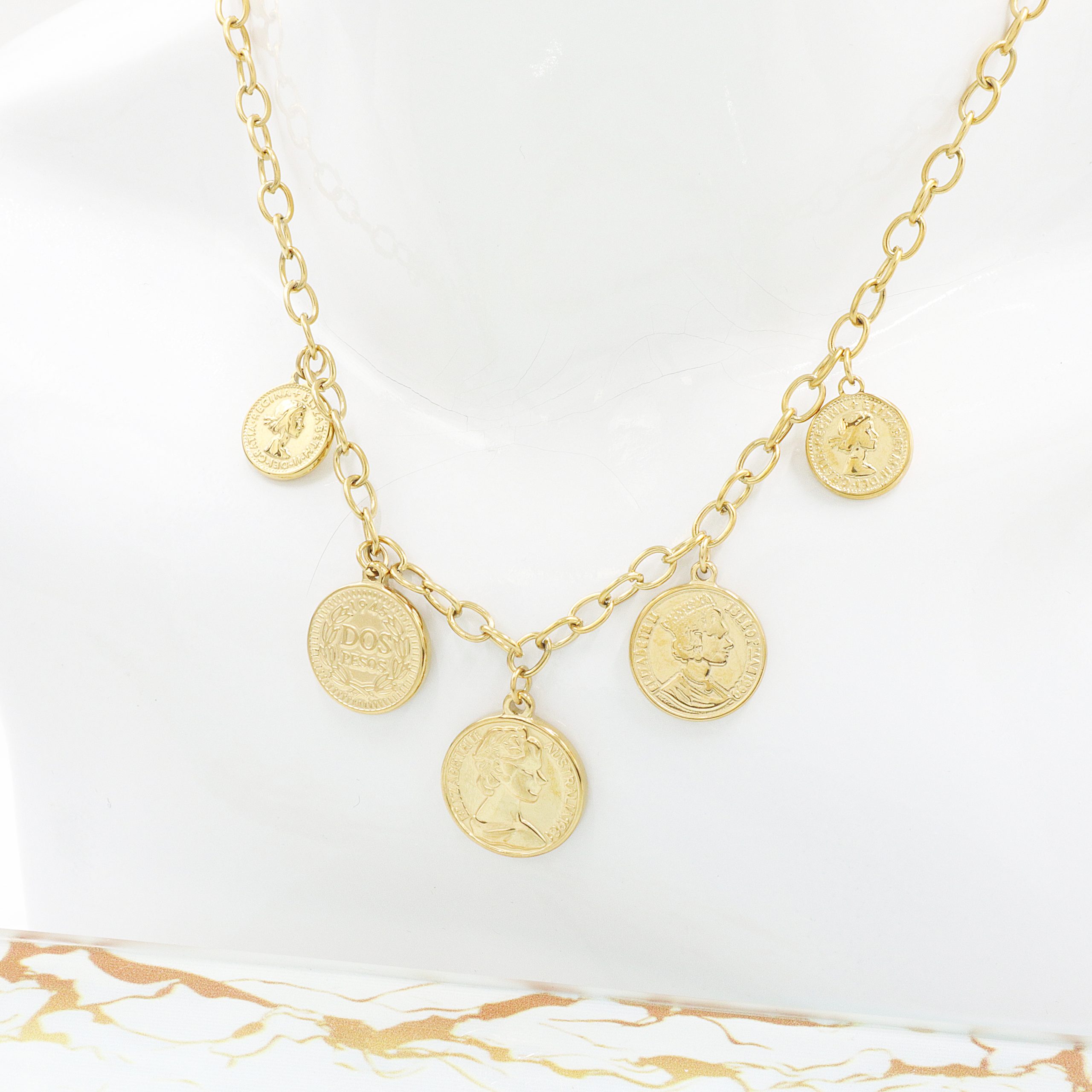 Ατσάλινο γυναικείο κολιέ με φλουριά και νομίσματα Ατσάλινο γυναικείο κολιέ με φλουριά και νομίσματα