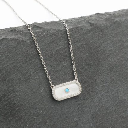 Ατσάλινο κολιέ με γαλάζια χάντρα και όψη φίλντισι, σε ασημί χρώμα