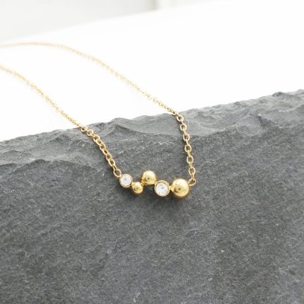 Ατσάλινο κολιέ με στρας, σε χρυσό χρώμα