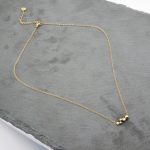 Ατσάλινο κολιέ με στρας, σε χρυσό χρώμα