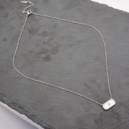 Ατσάλινο κολιέ με γαλάζια χάντρα και όψη φίλντισι, σε ασημί χρώμα